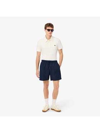 LACOSTE - Mid Length Monochrome Swim Trunks NAVY